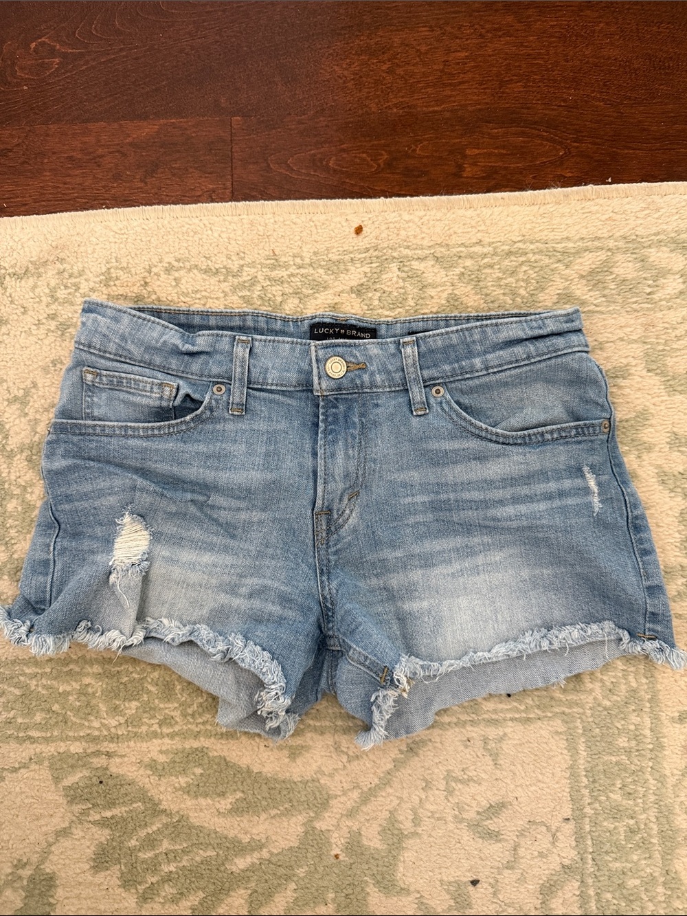 Lucky Brand Distressed Light Blue Denim Shorts with Frayed Hem